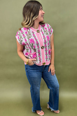 Person wearing leopard print pants on a light blue background