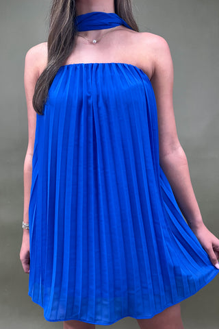 Blue strapless dress worn by a person on a plain background