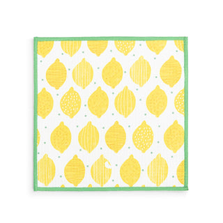 Quilt with yellow lemon pattern on a white background