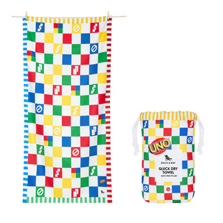 Colorful checkered towel and pouch with UNO branding on a white background