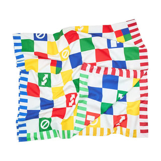Colorful checkered blanket with various symbols on a white background