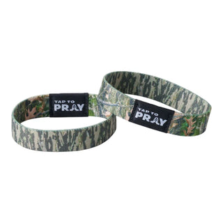 Two camouflage wristbands with 'Tap to Pray' labels on a white background