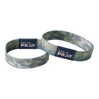 Two camouflage-patterned wristbands with 'Tap to Pray' labels on a white background