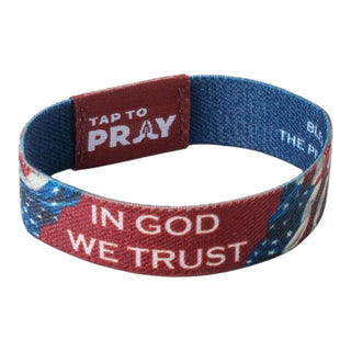 Wristband with 'Tap to Pray' and 'In God We Trust' text on a white background