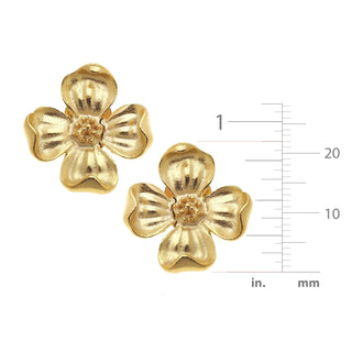 Gold flower-shaped earrings with a measurement scale on a white background