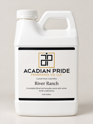 A white half-gallon plastic jug of Acadian Pride Fragrance Co. LLC River Ranch luxurious laundry scent, shown against a neutral light beige background.