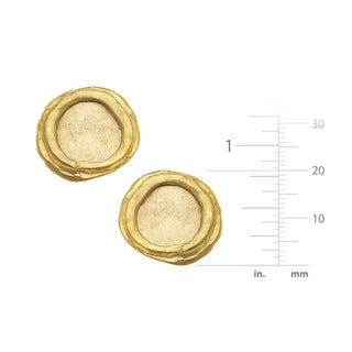 Gold earrings with a measurement scale on a white background