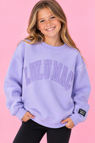 lavender purple crewneck sweatshirt with 'LULUMAC' printed in arched letters on the chest