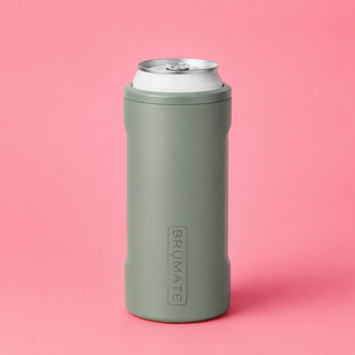 Green can cooler with a silver can on a pink background