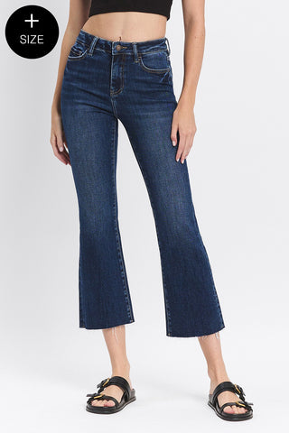 Person wearing blue jeans on a white background