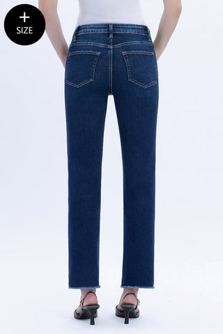 Blue jeans worn by a person on a white background