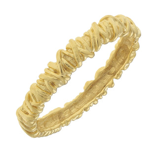 Gold ring with textured band on a white background
