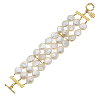 Pearl bracelet with gold clasps on a white background