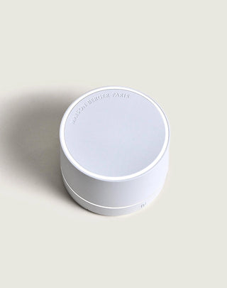 White cylindrical container with 'Bourjois' branding on a light gray background