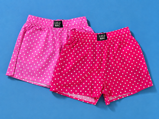 Polka Dot Boxer Shorts featuring a pink and white polka dot print, 100% cotton, elastic waistband, and relaxed fit.