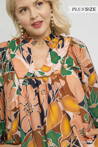 Woman wearing a floral blouse with a 'Plus Size' label in the corner.