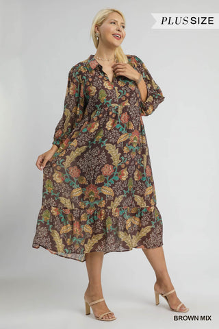 Woman wearing a floral patterned dress on a white background