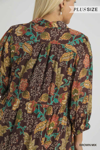 Floral patterned blouse with brown mix color on a plain background