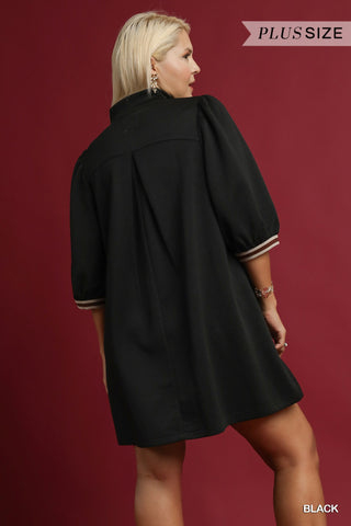 Woman wearing a black coat against a red background with 'Plus Size' text.