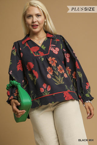 Woman wearing a floral blouse with a green bag against a beige background