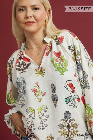 Woman wearing a plus-size floral blouse against a red background