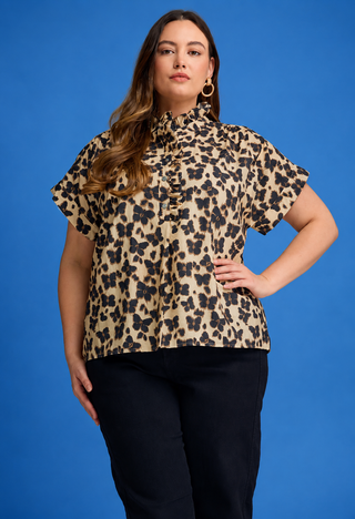 Ruffle Mock Neck Button top ,100%cotton with a ruffle neckline, button front, and elegant butterfly-inspired print.
