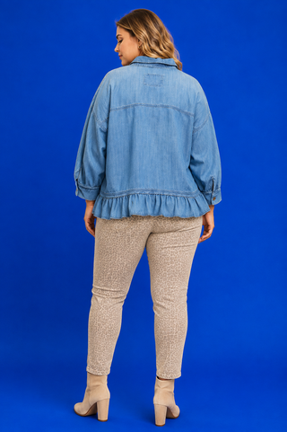 Blue Button Up Tiered Denim Top in soft 100% Tencel with a button front, chest pocket, tiered peplum hem, and relaxed fit.