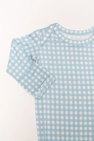 Light blue and white checkered shirt on a white background