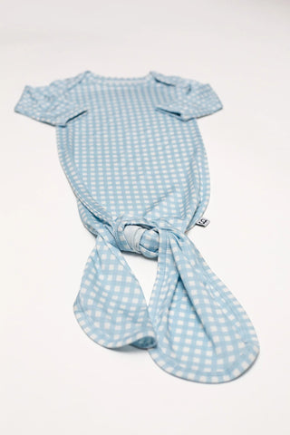 Blue checkered baby wrap on a white background