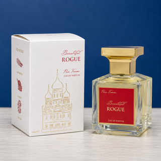 Perfume bottle and packaging of 'Beautiful Rogue' on a blue background