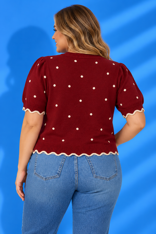 Scalloped Knit Top featuring soft knit fabric, ivory polka dots, puff sleeves, and scalloped trim for cozy boutique style.