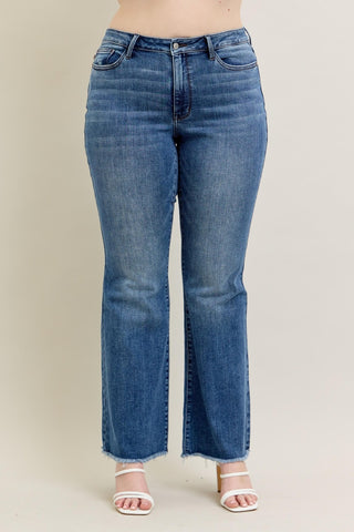 Blue jeans on a plain background