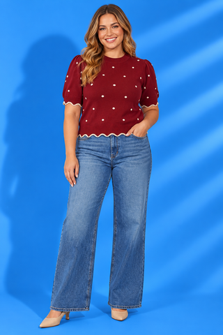 Scalloped Knit Top featuring soft knit fabric, ivory polka dots, puff sleeves, and scalloped trim for cozy boutique style.