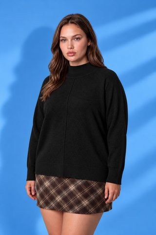 Black mock neck sweater with long sleeves, ribbed cuffs and hem, relaxed fit, and center seam detail.