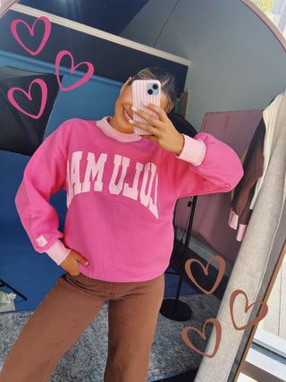 Yellow Lulu Mac sweatshirt with light blue lettering, mock neck, cuffs, and hem for a sporty color-block look.