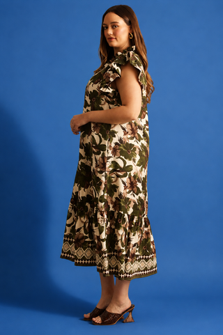  a tiered midi dress with a dark green and brown floral print on a beige background, featuring ruffled cap sleeves 