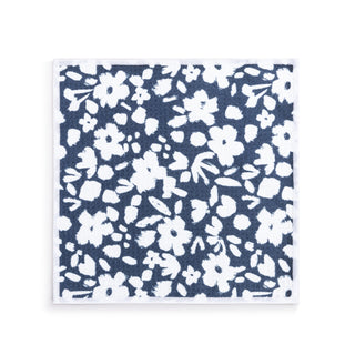 Napkin with white floral pattern on a blue background