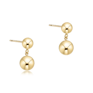 eNewton Classic 8mm Ball Drop Stud Earrings in classic gold featuring polished gold ball studs with suspended 8mm gold ball drops and secure post backs displayed on an eNewton jewelry card.