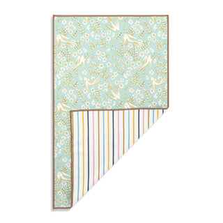 Folded fabric with floral and striped pattern on a white background