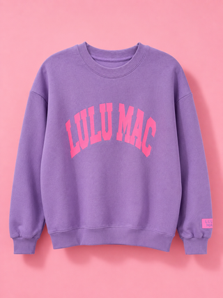 Violet Pop Puff Letter Crewneck featuring hot pink puff lettering, a soft fleece cotton-blend, relaxed fit, and cozy everyday