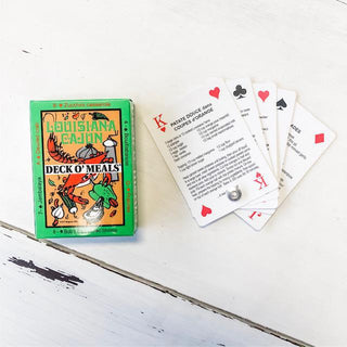 Louisiana Cajun Deck O' Meals card game packaging with playing cards on a white surface