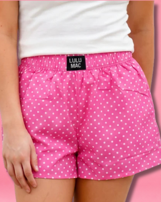 Polka Dot Boxer Shorts featuring a pink and white polka dot print, 100% cotton, elastic waistband, and relaxed fit.