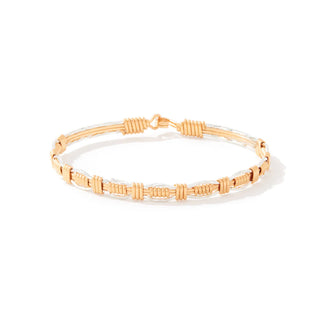 Gold bracelet on a white background