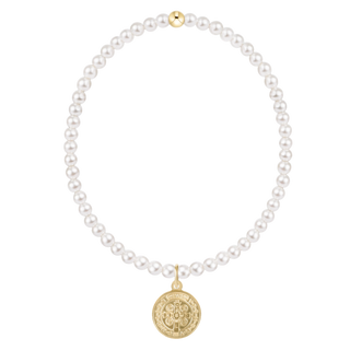 Pearl necklace with a gold pendant on a white background