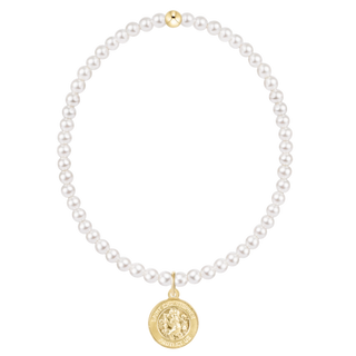 Pearl necklace with a gold pendant on a white background
