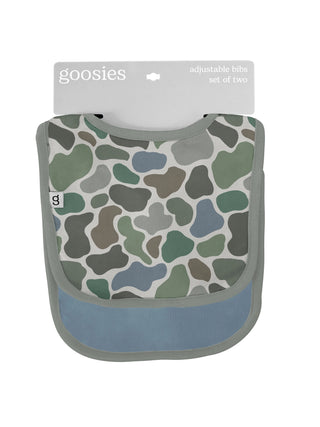 Patterned bib with blue accent and 'goosies' branding on a white background