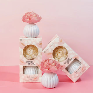 Shop the Sweet Grace Flower Diffuser by Bridgewater Candle Company. Enjoy up to 60 days of fragrance with a beautiful flower that turns pink.