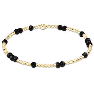 Shop the Enewton Gameday Flirty Hope Unwritten Bracelet featuring gold beads and colorful accents. Available in Black, Golden Yellow, and Red.