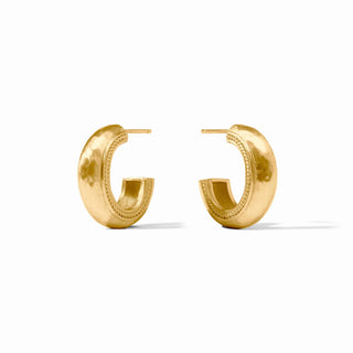 Pair of gold hoop earrings on a white background