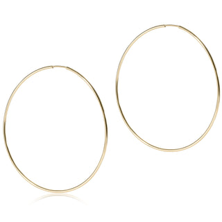 Gold hoop earrings on a white background
